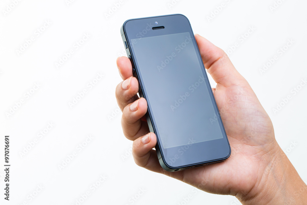 Female hand holding a smart phone, isolated on white Female hand holding a smart phone, isolated on white