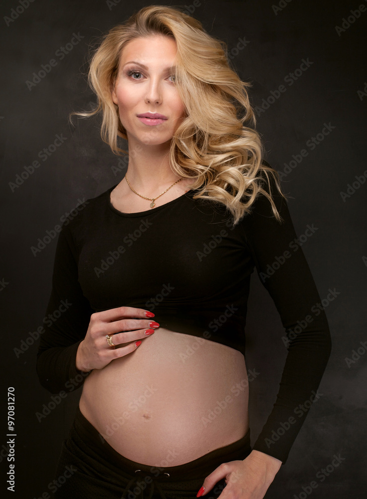 Pregnant woman in studio. Pregnant woman in studio.