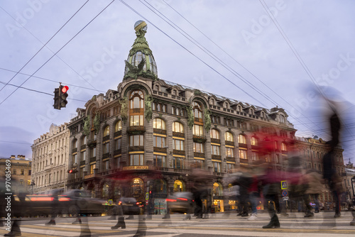 blurred pedestrians on the Nevsky Prospect near the Zinger building. photo