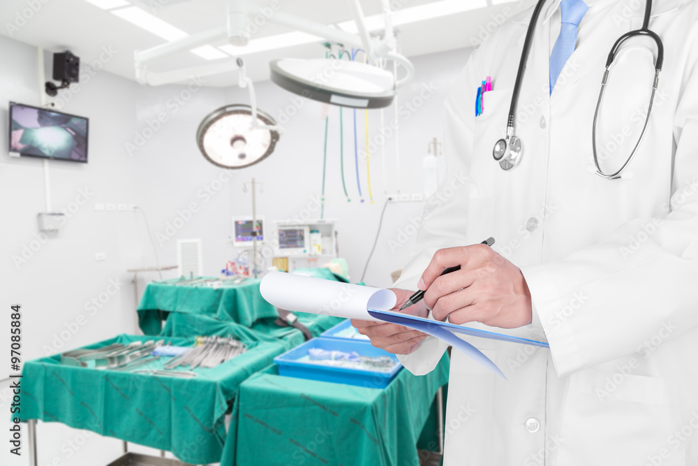 Doctor writing a medical prescription with medical background Doctor writing a medical prescription with medical background