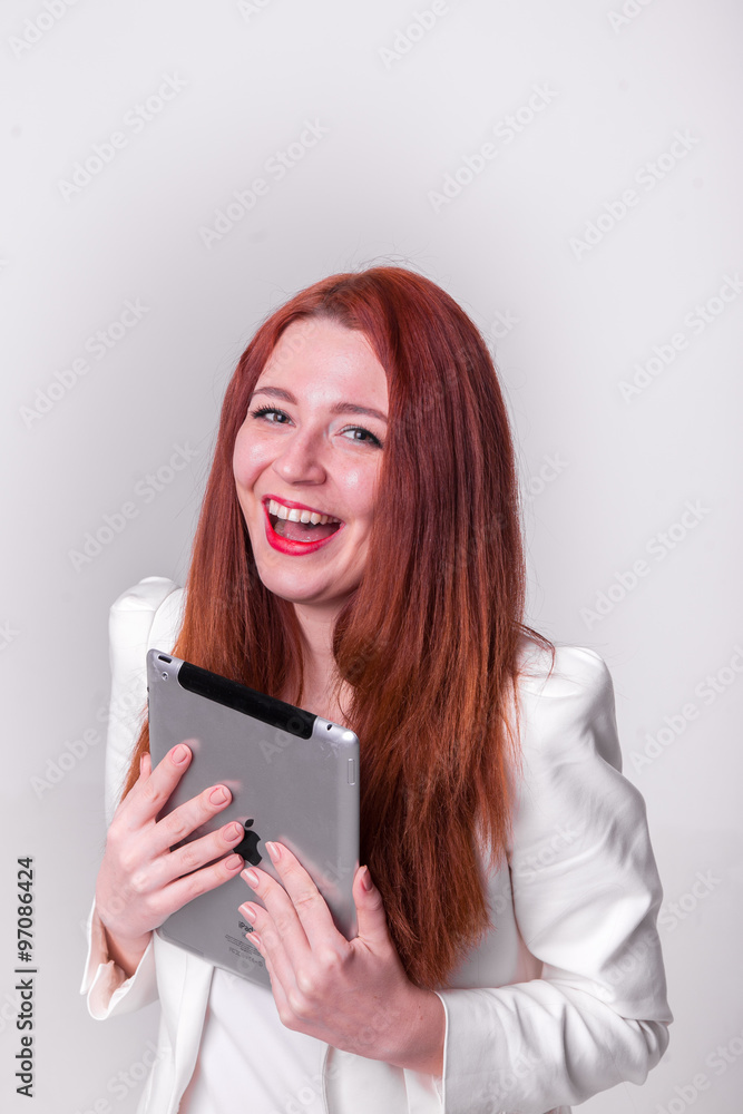 red businesswoman holding tablet and showing thumbs up isolated over white red businesswoman holding tablet and showing thumbs up isolated over white