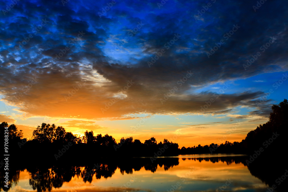 Sunset sunrise with clouds, light rays and other atmospheric effect Sunset sunrise with clouds, light rays and other atmospheric effect