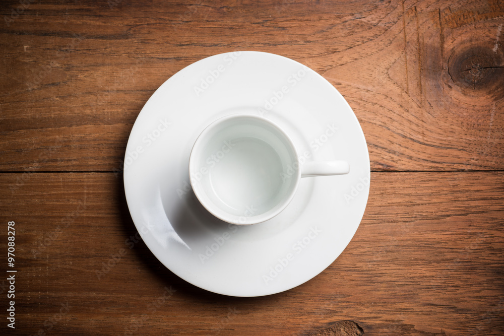 Empty coffee cup on the wood table Empty coffee cup on the wood table