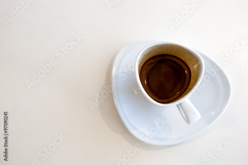 Cup of coffee on White table