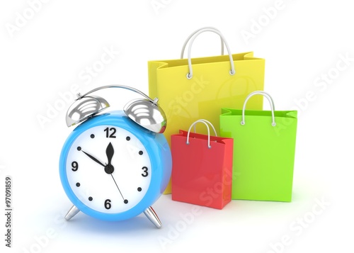 alarm clock and shopping bag (time to buy concept)