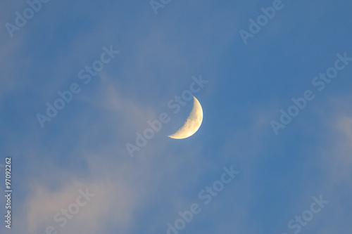 abstract daytime crescent moon in the sky background