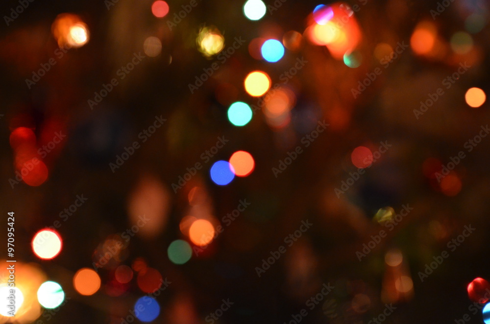 Abstract blurred bokeh background of Christmas garland lights.Soft focus.