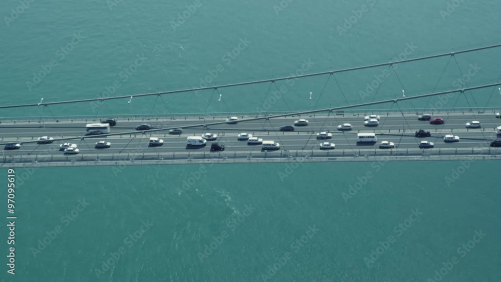 Aerial top view of Bosphorus Suspension Bridge in Istanbul Turkey which connects Asia and Europe with cars moving Aerial top view of Bosphorus Suspension Bridge in Istanbul Turkey which connects Asia and Europe with cars moving