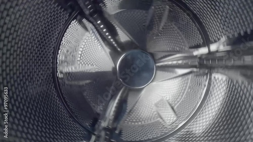 Washing machine drum turning with different speeds the camera is also moving