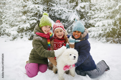 Kids with puppy