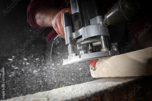 Obraz na płótnie drill machine drilling a wood board