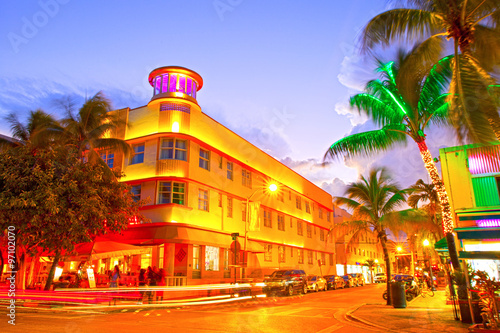 Miami Beach, Florida Moving traffic hotels and restaurants at sunset on Ocean Drive, world famous destination for it's nightlife, beautiful summer  weather and pristine beaches