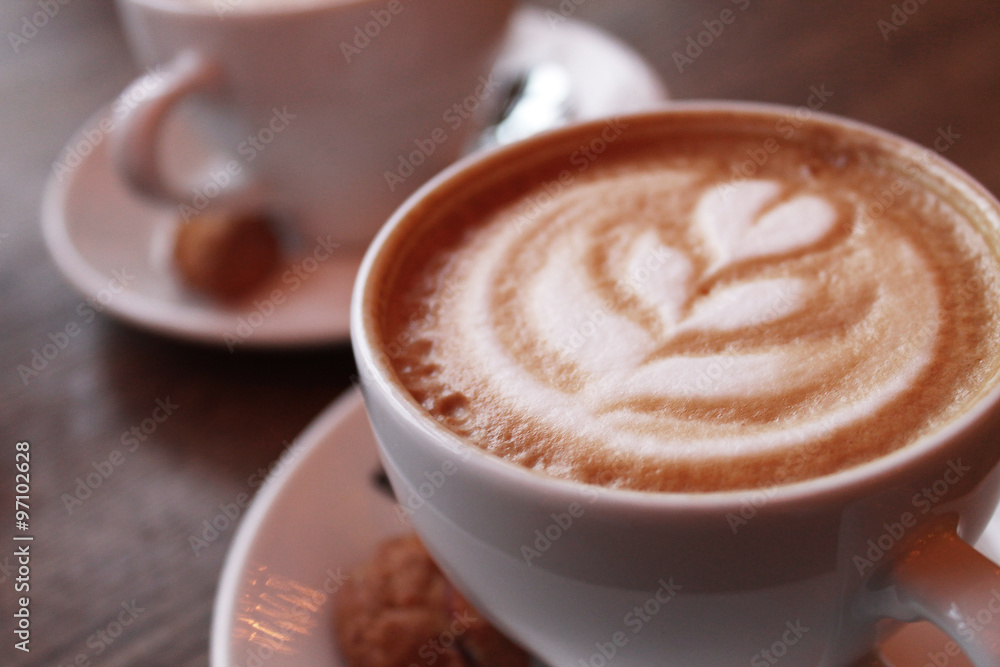 Fototapeta premium two cups with creamy cappuccino