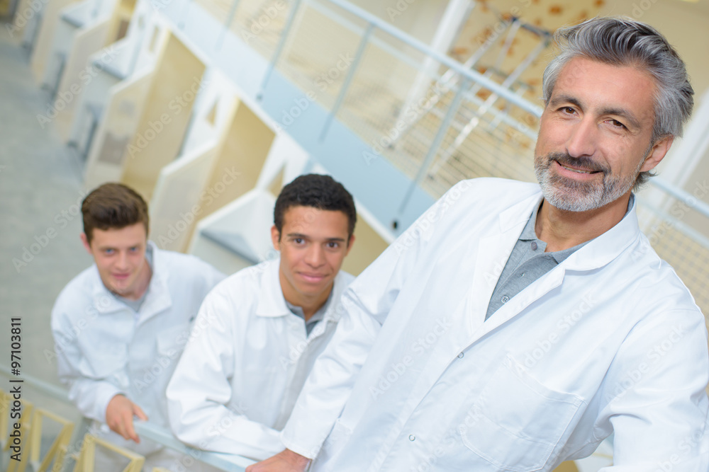 Fototapeta premium three men in white uniform