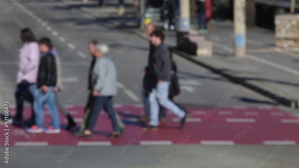 Side view blurry pedestrians crossing a street in the city of Barcelona. Time Lapse (10) Side view blurry pedestrians crossing a street in the city of Barcelona. Time Lapse (10)