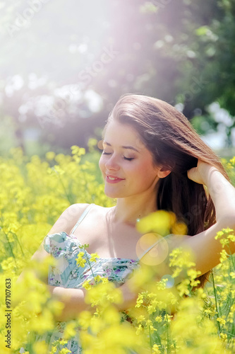 happy girl in a field of flowers