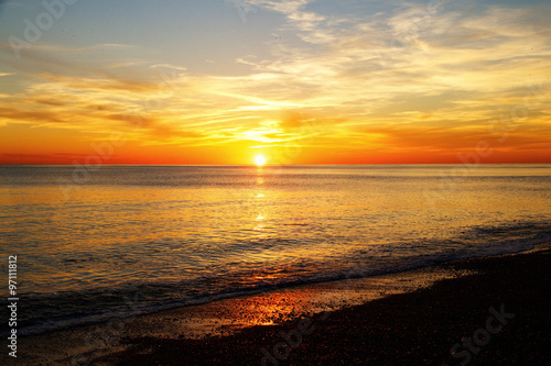 Sun rising over the sea Brighton, England, UK, © Neil Lang