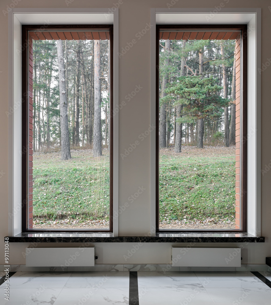 Interior of modern empty space with big windows Interior of modern empty space with big windows