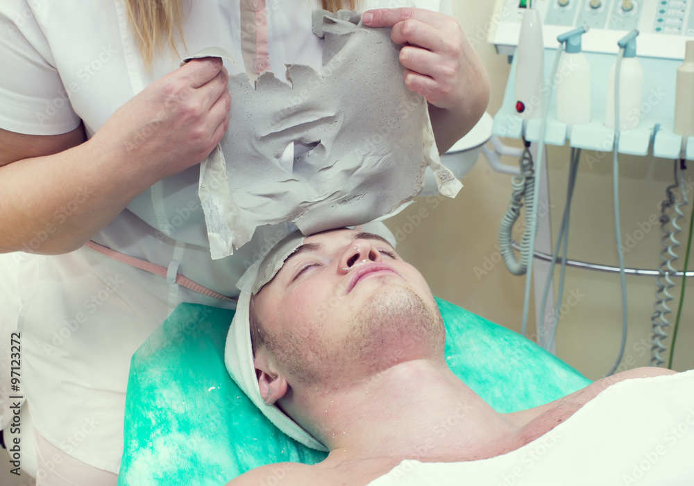 man in the mask cosmetic procedure in spa salon man in the mask cosmetic procedure in spa salon