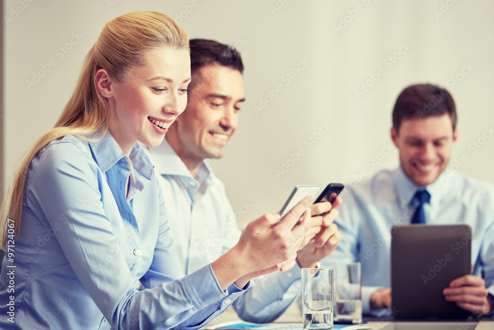 businesspeople with smartphones and tablet pc businesspeople with smartphones and tablet pc
