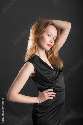 sensual girl in a black dress