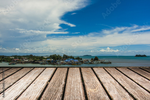 sky with wood pier