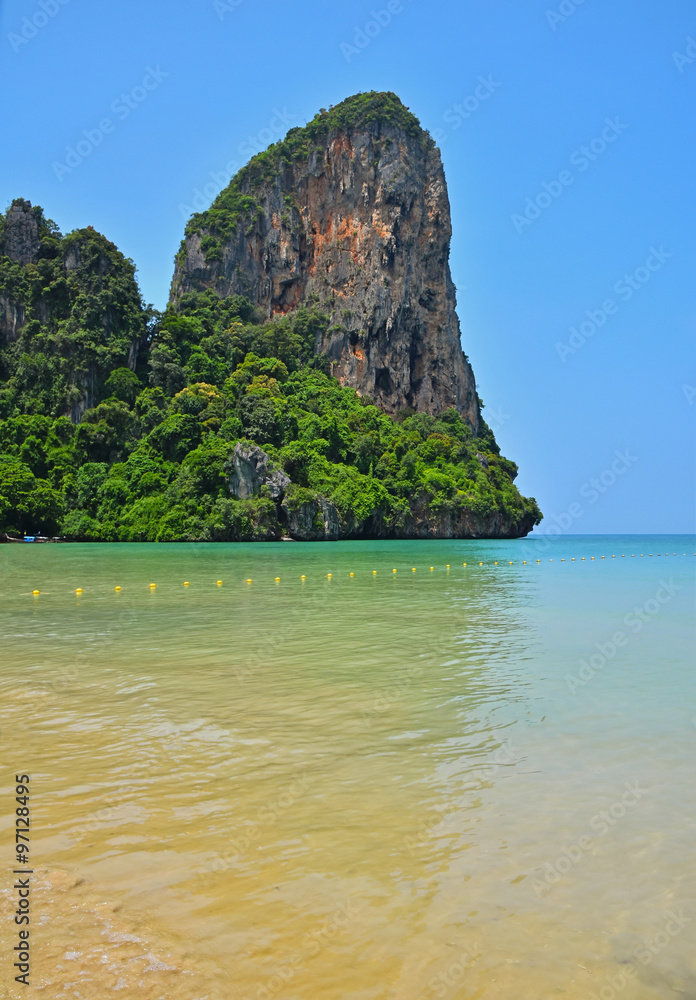 Obraz premium Paradise tropical sand sea beach with rock