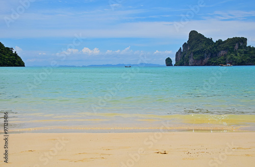Paradise tropical sand sea beach with rock