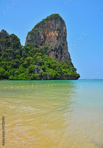 Paradise tropical sand sea beach with rock
