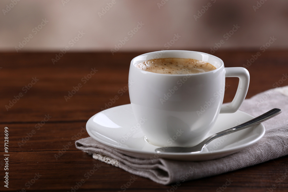 Fototapeta premium Cup of coffee on table close up