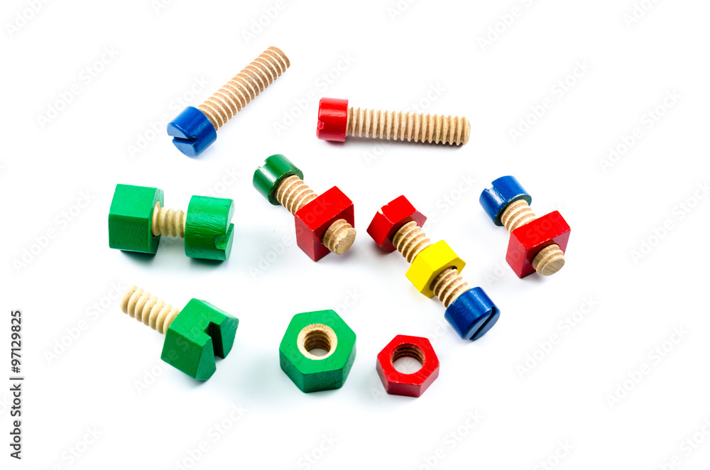 Colorful wooden nuts and bolts toy isolated on white background Colorful wooden nuts and bolts toy isolated on white background