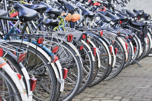 Row parked bicycles in Amsterdam