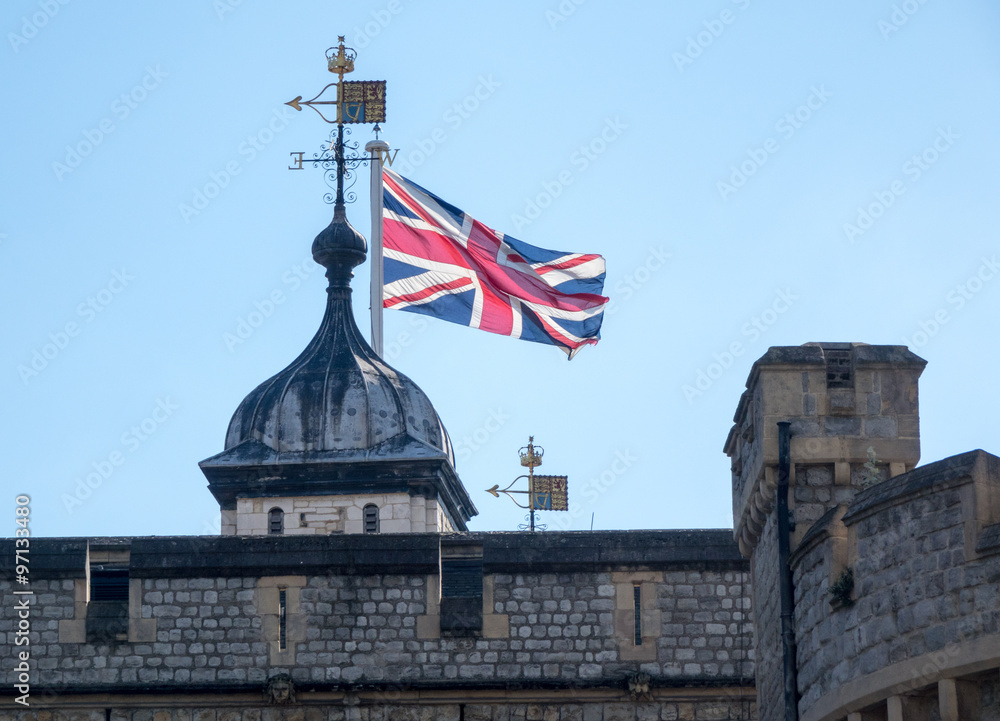 Union Jack flag rises above Tower of London