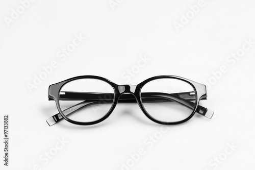 The black glasses on a light background.