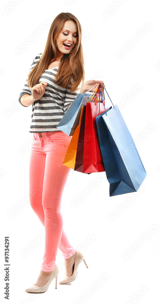 Young pretty woman with shopping packages isolated on white Young pretty woman with shopping packages isolated on white