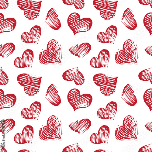 Seamless pattern with hand drawn heart shapes
