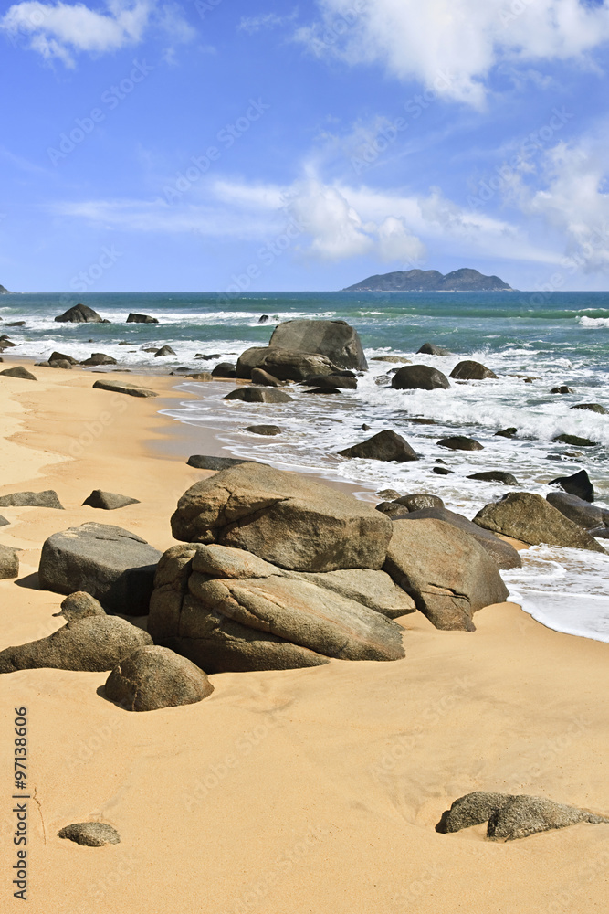 Tropical beach with rocks, Sanya, Hainan Island, China