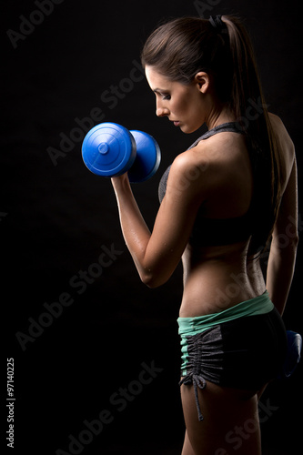 fitness woman on black background