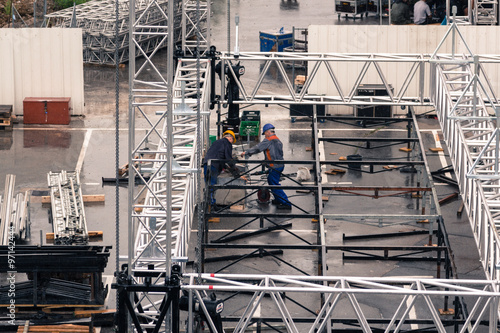 Ljubljana, Slovenia - June 19, 2015. Flow Festival Ljubljana,Tabacna, preparations for the festival, stage under construction during the rain.