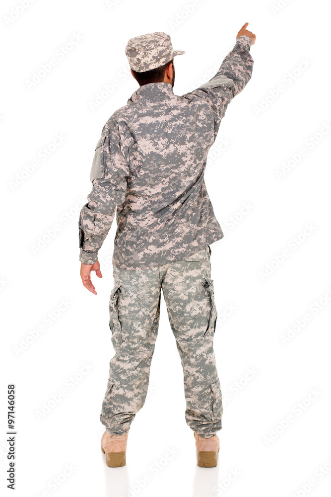 military serviceman pointing empty space military serviceman pointing empty space