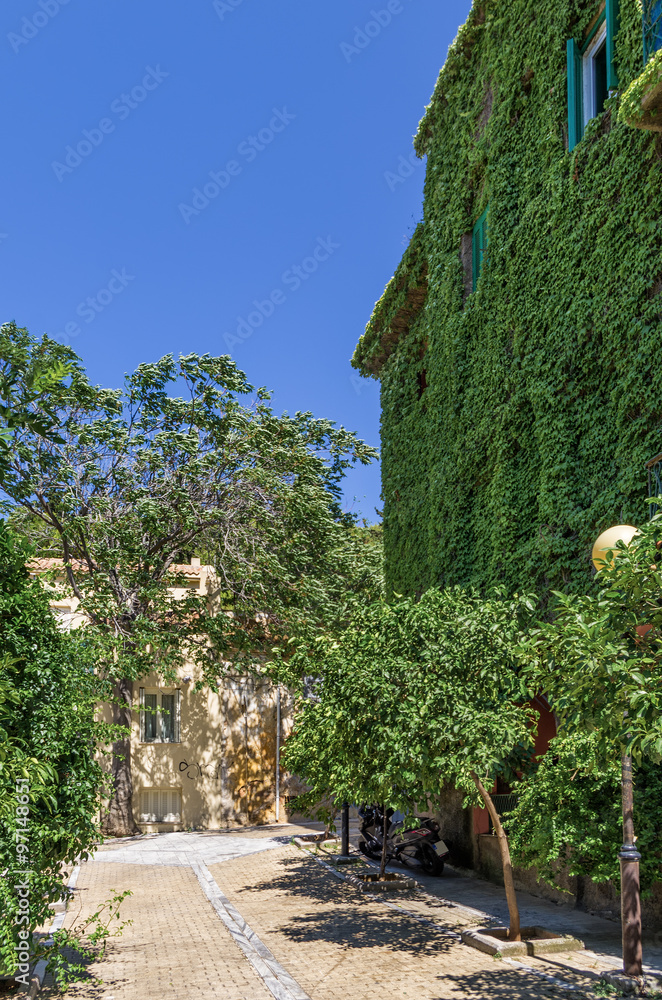 Naklejka premium Beautiful street in Mets neighborhood, Athens, Greece