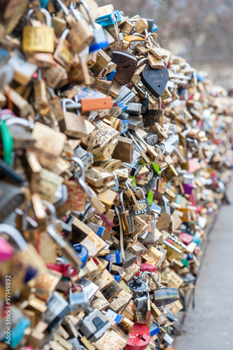 The tradition of leaving pad locks on a bridge to represent love and memories