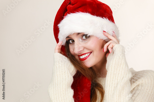  woman wearing santa claus hat portrait.