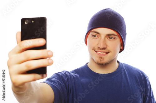 young man making photo of himself