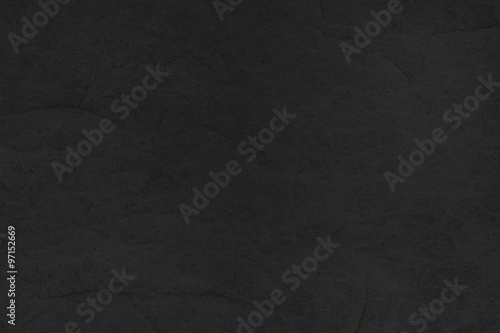 black slate stone tile background - granite texture closeup photo