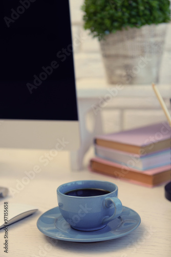 Fototapeta Naklejka Na Ścianę i Meble -  Blue cup of tea on modern table