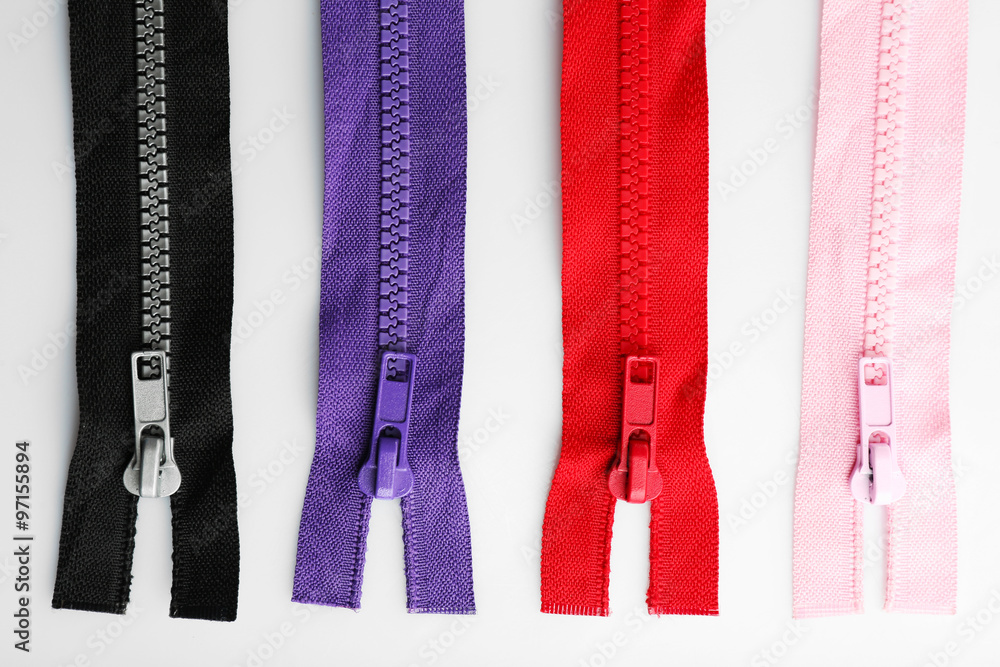 Colourful collection of zippers isolated on white Colourful collection of zippers isolated on white