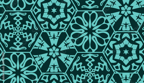 ector seamless background of hexagons decorated with patterns. Snowflakes and hexagons patterns. Blue geometrical seamless background.
