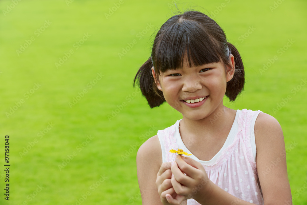 A happy Oriental little girl lovely expression A happy Oriental little girl lovely expression