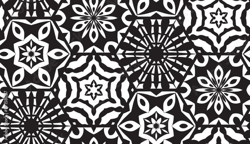 ector seamless background of hexagons decorated with patterns. Snowflakes and hexagons patterns. Black geometrical seamless background.